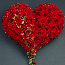 Interflora_sorghjerte_roser