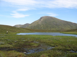 Fuggetind sett fra fjellvann på Storåsen ©gunnmg Fuggetind sett fra fjellvann på Storåsen