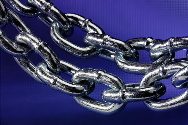 Two pieces of silver chain links Backgrounds