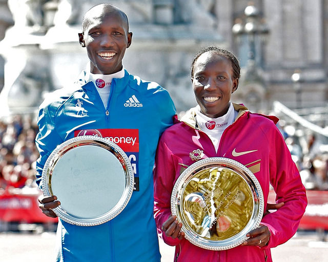 The winners of the Elite Men's and Women's races at The Virgin Money London Marathon 2014 - Wilson Kipsang and Edna Kiplagat of Kenya with their salvers at the presentation ceremony on Sunday 13 April 2014Photo: Dillon Bryden/Virgin Money London Marathon Dillon Bryden/Virgin Money Londo
