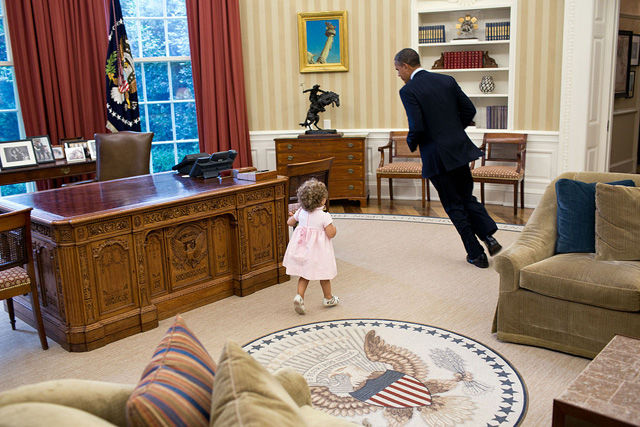 Barack Obama running in the Oval Office. By Pete Souza (The White House – P070912PS-0271) [Public domain], via Wikimedia Commons
