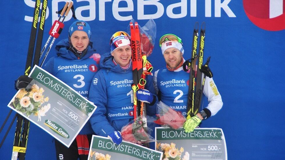Seierspallen etter mennenes fristilløp på Gåsbu ble besatt av (fra v.) Daniel Stock, Simen Hegstad Krüger og Per Kristian Nygård (Foto: Stein Arne Negård)