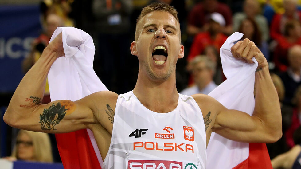 GLASGOW, SCOTLAND - MARCH 03:  Marcin Lewandowski of Poland ccelebrates winning gold in the final of the men