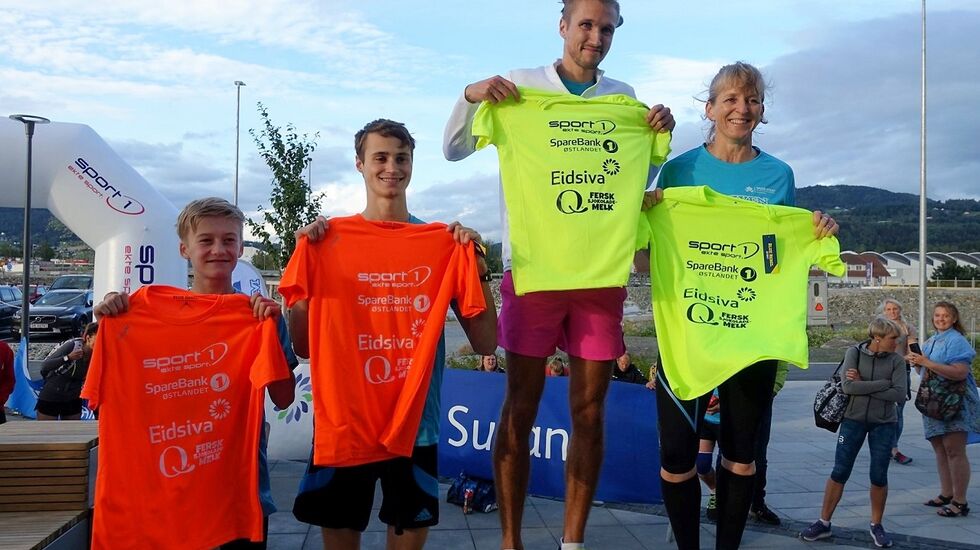 Anne Bjørberg Jenssen (til h.)  og Elmer Skalle med de gule ledertøyene etter  premiere-prologen i Tour of Mjøsa. (Foto fra Tour of Mjøsa's facebookside)