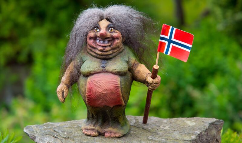 Illustrasjonsbilde til reiselivsnæringen: Et troll med norsk flagg