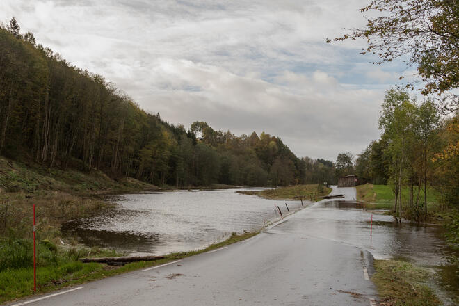 Kristiansand, Norway - October 3, 2017: Flooding from the river Tovdalselva, water in the road