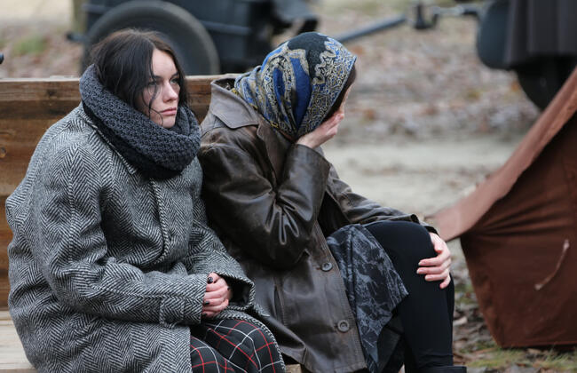 Belarus, the city of Gomil, November 21, 2015. The streets of the town. Tired women are sitting on the street. Refugees