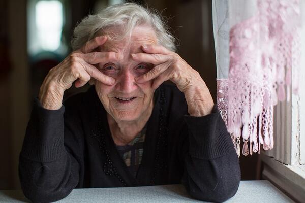 Portrait of funny elderly woman.