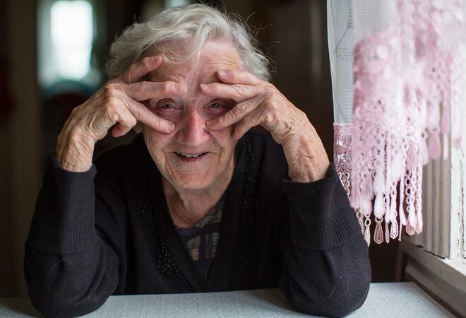 Portrait of funny elderly woman.
