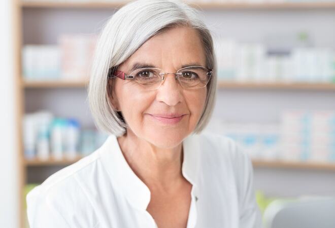 Senior lady pharmacist at work in the pharmacy