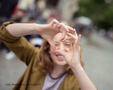 RED Str 12063379-happy-teen-girl-forming-heart-shaped-hands[1]