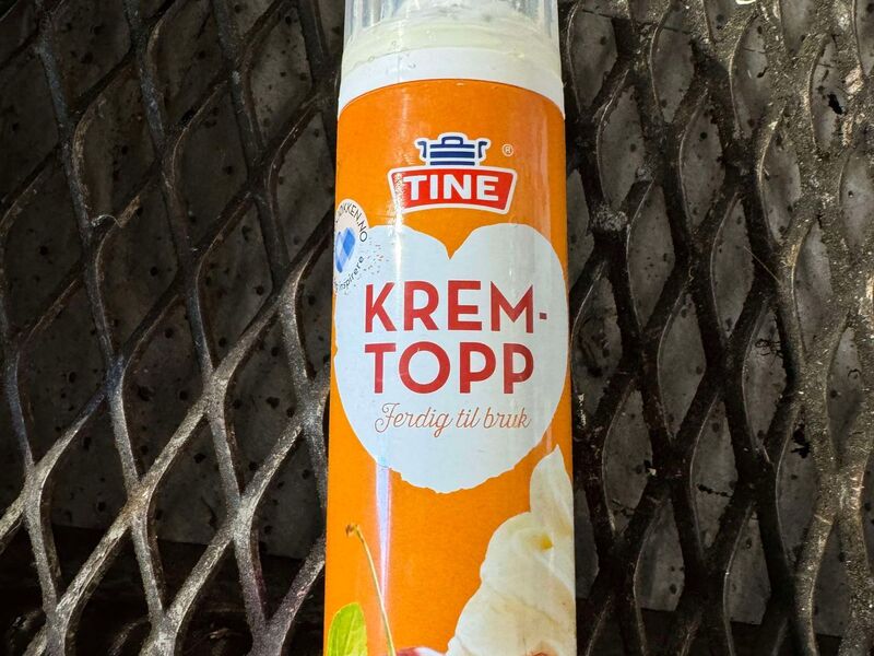Bilde av en trykkbeholder/sprayboks med krem