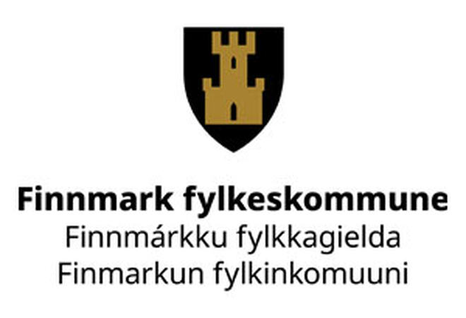 Finnmark fylkeskommunes logo. Illustrasjon av tårn med skyteskår (middelalderstil) i gull på svart skjold.