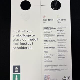 Bilde av lapp med informasjon om sortering av glass- og metallemballasje.